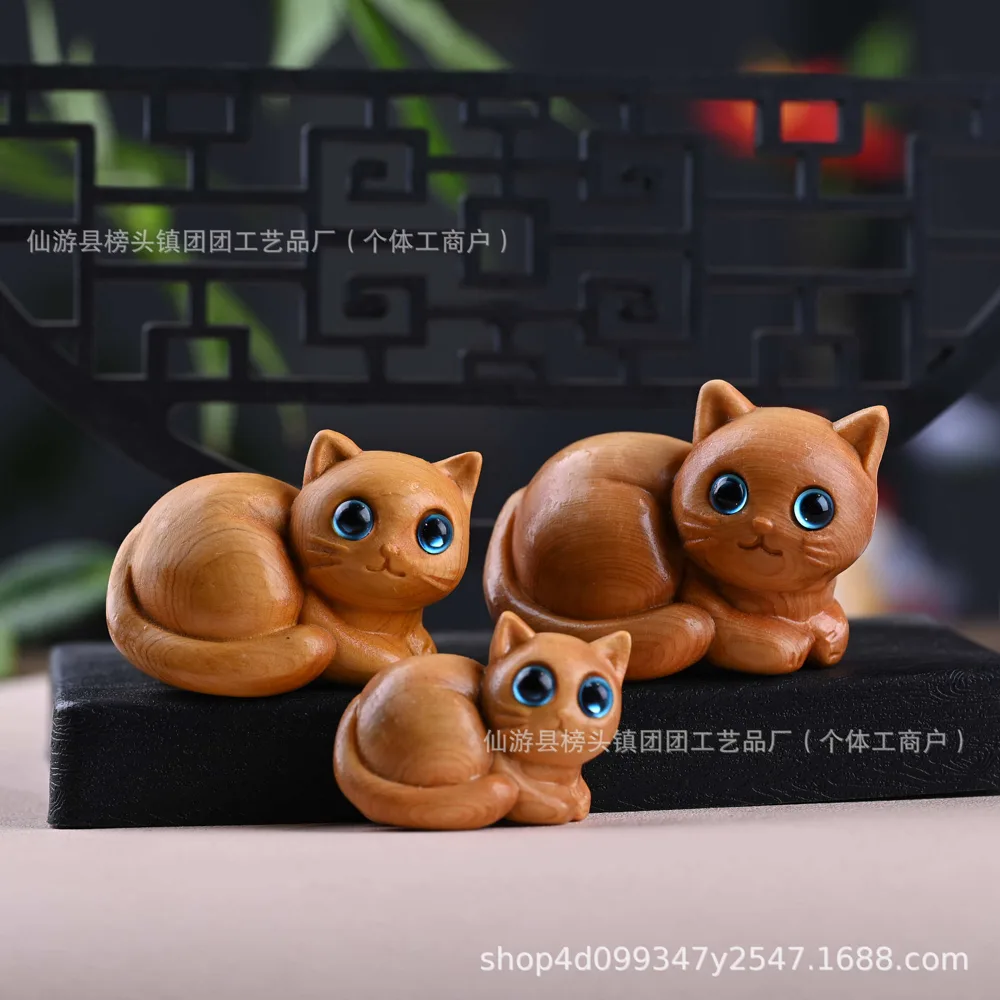 崖柏木雕小猫手把件